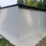 Garaz-Blaszany-6×6-automatem-grafit-bialy-premium-Sposob-otwierania-bramy-brama-podnoszona.webp