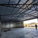 Garaze-blaszane-blaszaki-hala-wiata-magazyn-10x27m-Marka-inna.webp