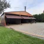 garaze-blaszane-blaszak-9x5drewnopodobne-zloty-dab-material-wykonania-metal-673365fc3c595.webp